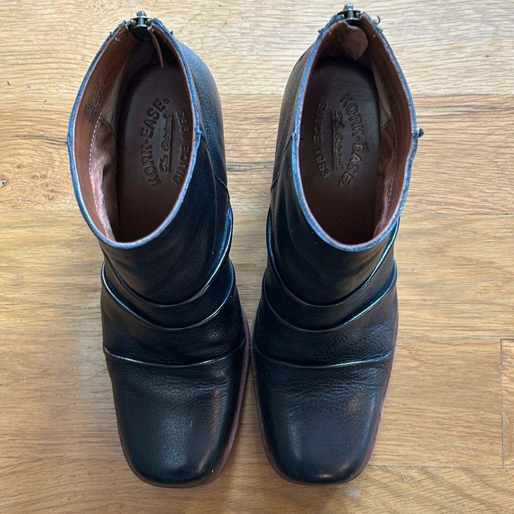Kork-ease booties in black leather with brown heels. Size 7.5